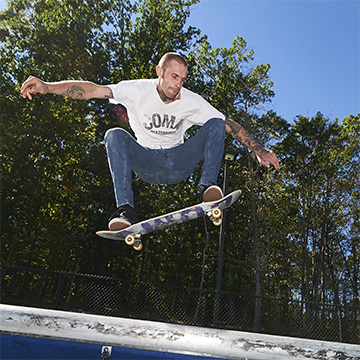 Brent Cordy rides one of his Coma skateboards.