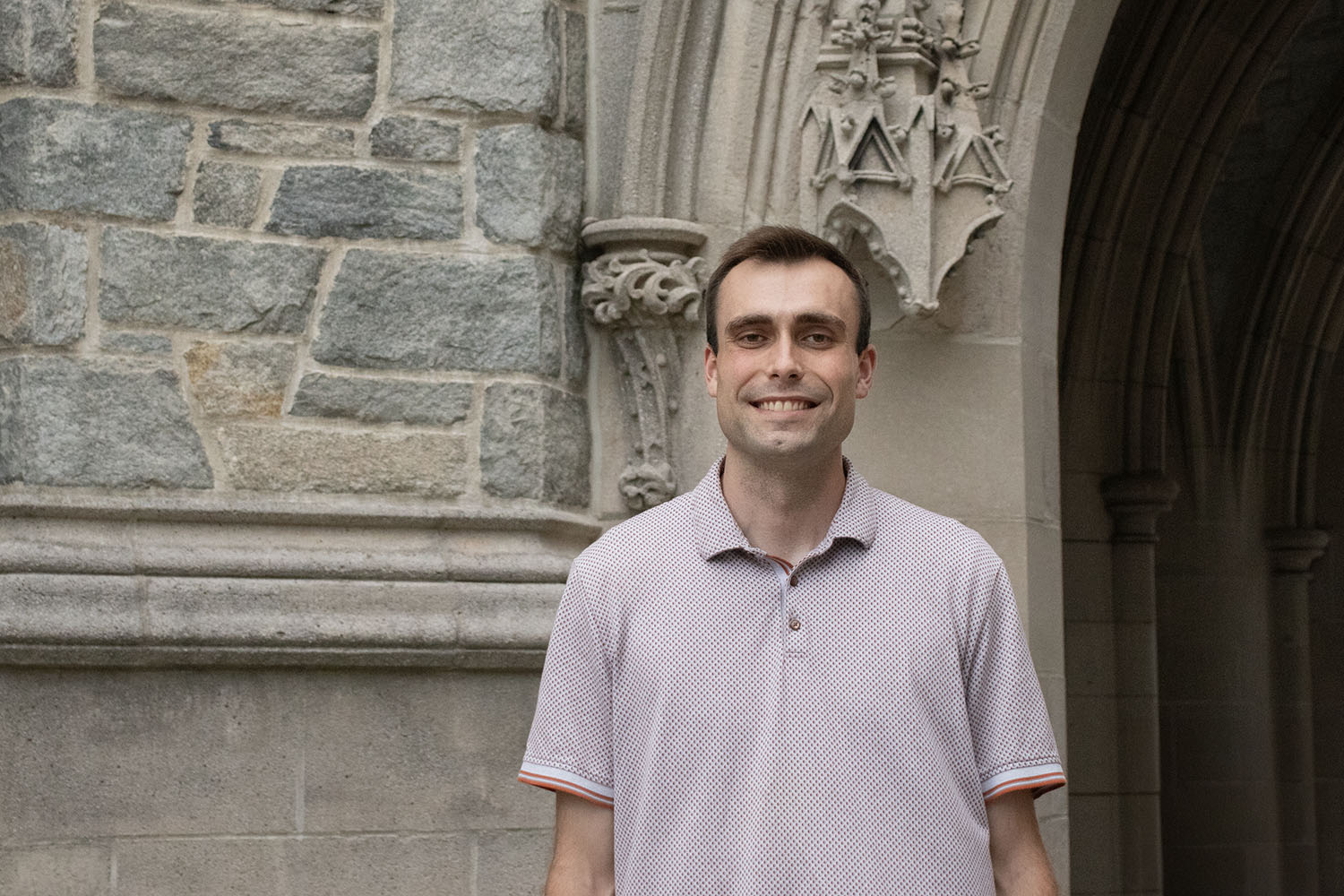 Tanner Larkin stands in front of Starr Hall