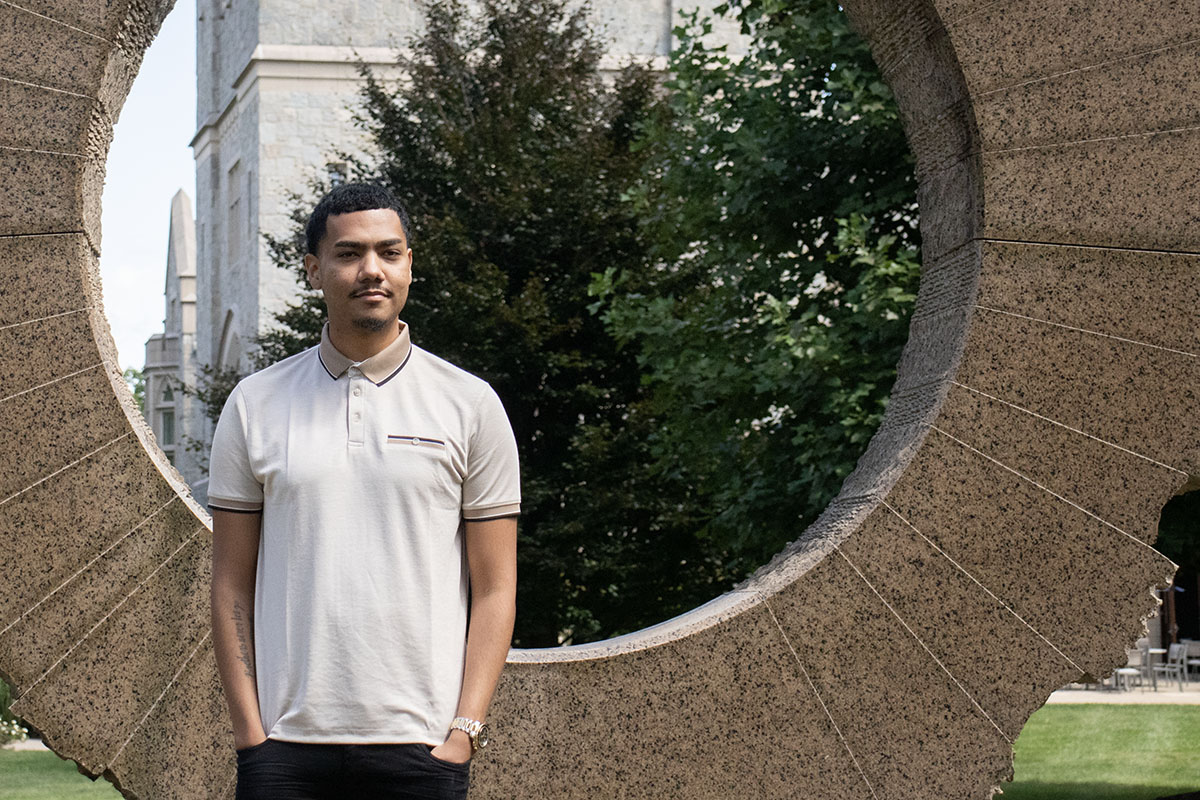 Victor Sosa in front of the Middle Path sculpture.