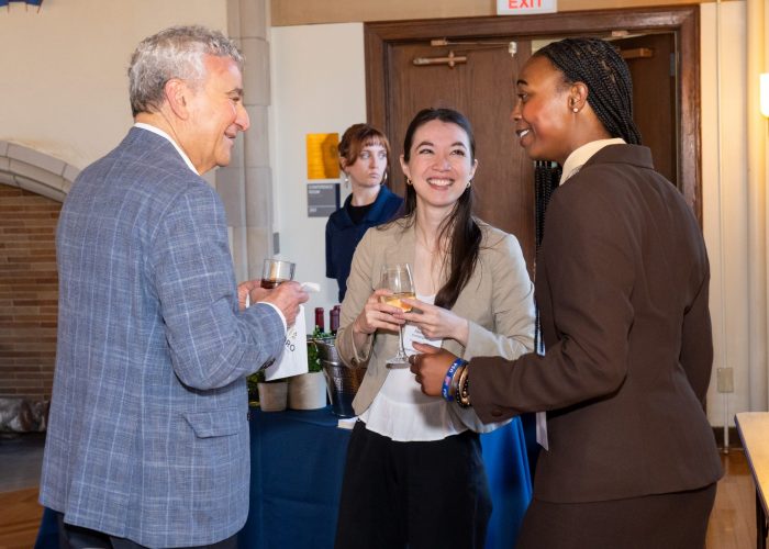 Alumni and students chatting
