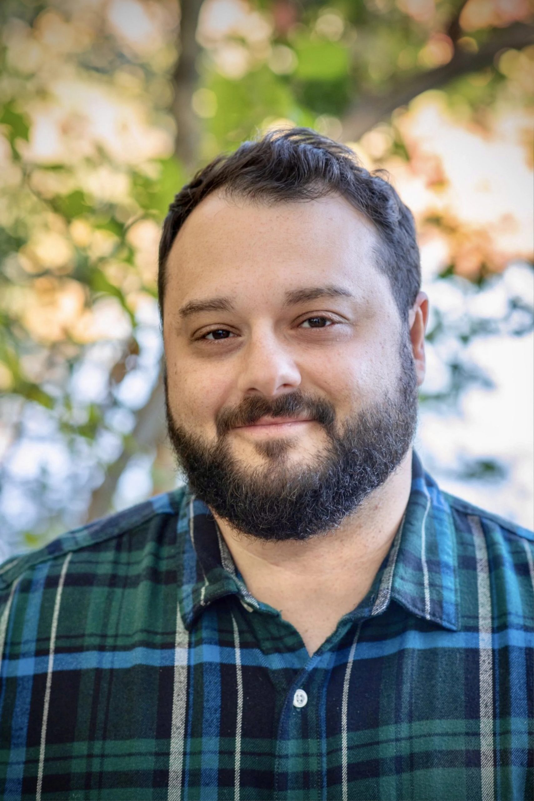 Headshot of Greg Kanaan